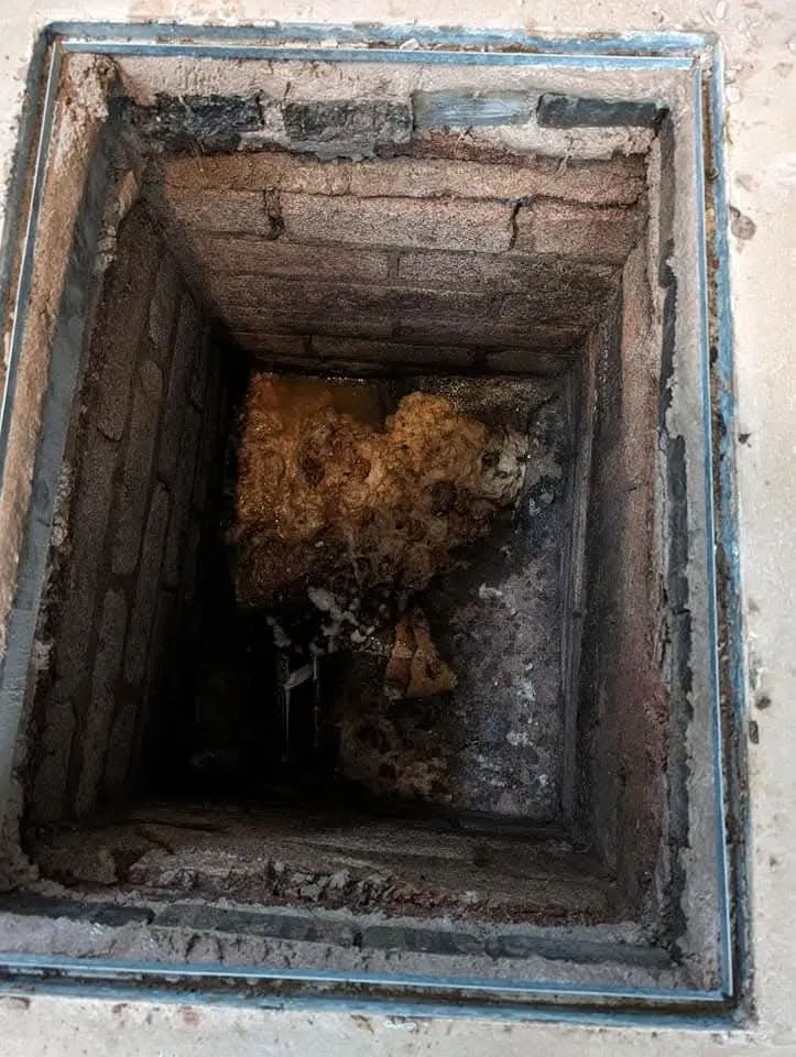 Picture showing a blocked drain manhole