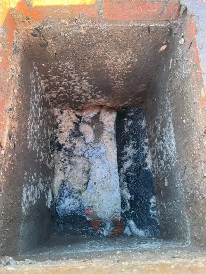Image of a severely blocked drain or manhole
