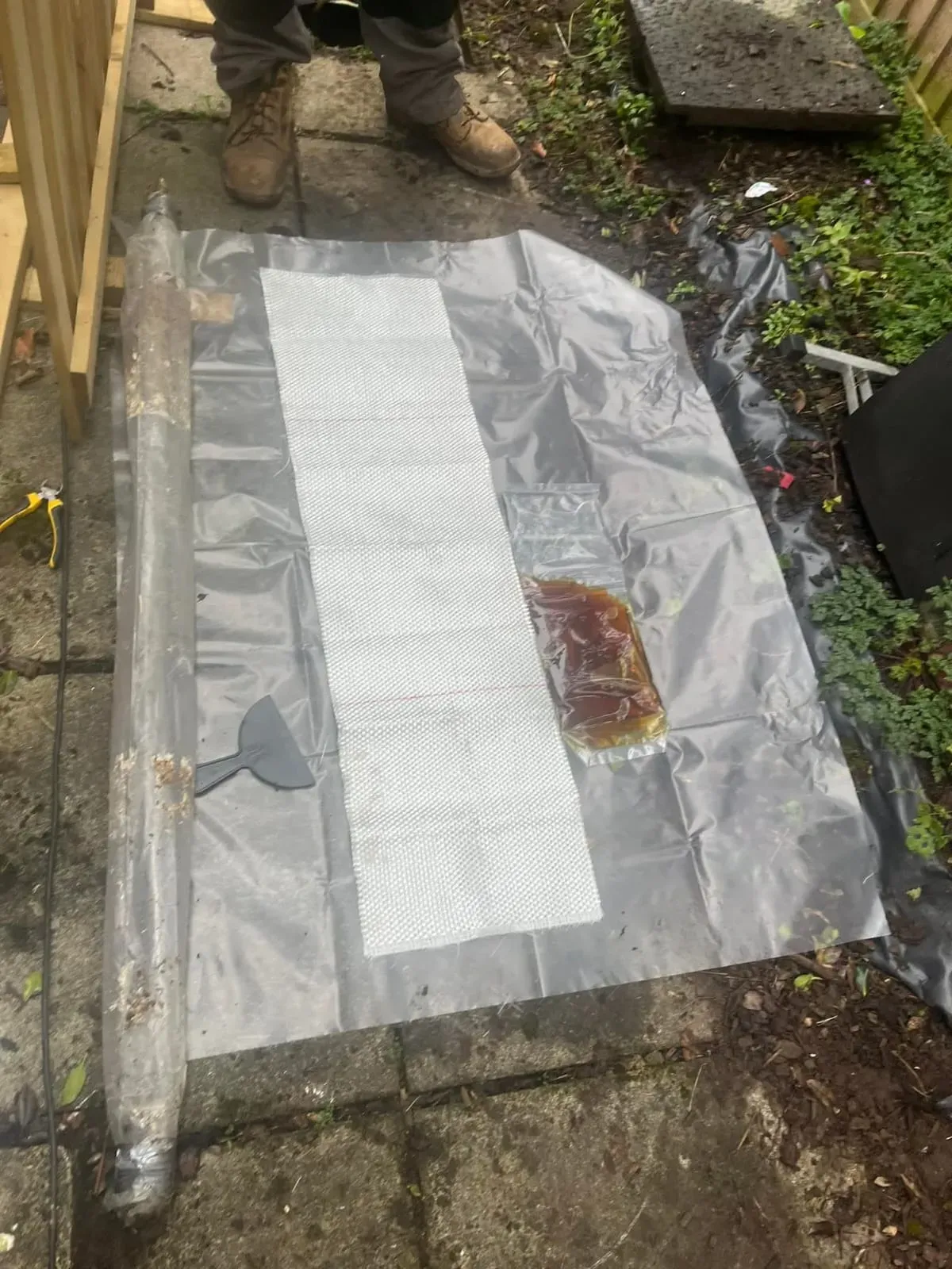 Equipment for trenchless drain repair, showing resin and liner